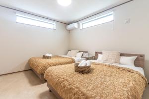 Postel nebo postele na pokoji v ubytování Grandioso Okinawa Pool Villa 8 - Vacation STAY 51219v + 34 fotografií