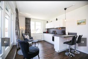 Køkken eller tekøkken på Schatzkiste mit Meerblick