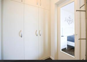 En eller flere senge i et værelse på Schatzkiste mit Meerblick