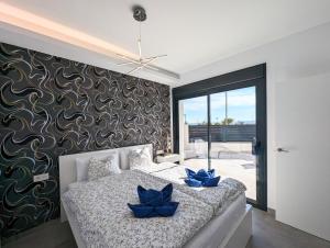 Postel nebo postele na pokoji v ubytování R-40-A Lujo con jacuzzi + 22 fotografií