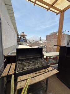 Gril dostupný pro hosty v apartmánu