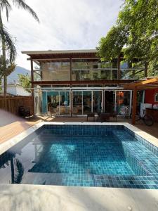 Πισίνα στο ή κοντά στο Conforto Maresias