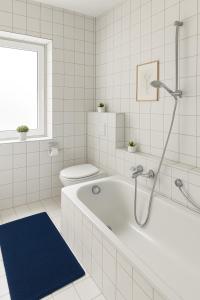 Ένα μπάνιο στο SUNNYHOME Monteurwohnungen und Apartments in Weiden