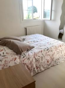 Postel nebo postele na pokoji v ubytování Gîte Naturma