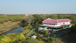 an aerial view of a house next to a river at จักรพันธ์วอลเลย์ in Ban Bang Toei (1)