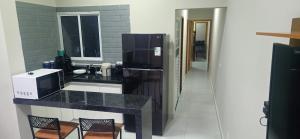 Køkken eller tekøkken på Casa Completa com 2 Quartos Conforto e Espaço