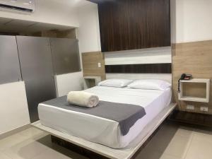 Ένα ή περισσότερα κρεβάτια σε δωμάτιο στο San Antonio Plaza +9 φωτογραφίες