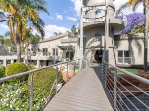 a walkway leading to the front of a building at Silva Villa in Bedfordview