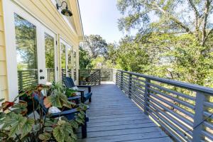 a porch with chairs and plants on a house at Skyline Views, Mins To Downtown in Atlanta