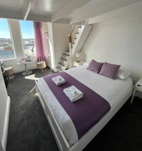 Postel nebo postele na pokoji v ubytování Reef Lodge