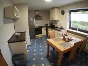 Η κουζίνα ή μικρή κουζίνα στο Am Waldrand