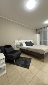 Postel nebo postele na pokoji v ubytování Confortevole appartamento vicino a San Raffaele Ospedale