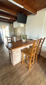 Μια τηλεόραση ή/και κέντρο ψυχαγωγίας στο Los Horneros Duplex - La Aguada