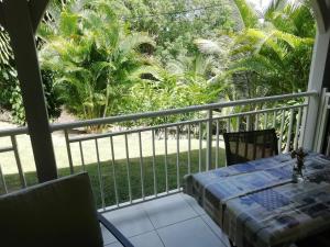 En balkon eller terrasse på Studio confortable à Le Gosier 37 m² avec jardin