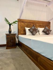 Postel nebo postele na pokoji v ubytování Jungle Nook Hiriketiya + 41 fotografií