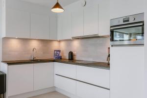 Η κουζίνα ή μικρή κουζίνα στο Stylish Family-Friendly Ostend Retreat, Close to Harbor and Free Parking