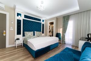 Postel nebo postele na pokoji v ubytování Microyal Hotel + 129 fotografií