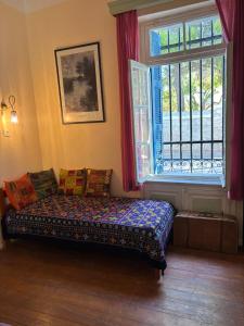 Postel nebo postele na pokoji v ubytování Giolman Guest House