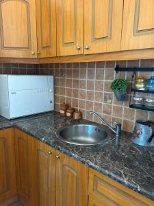 Kuchyň nebo kuchyňský kout v ubytování Giolman Guest House