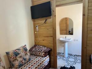 TV a/nebo společenská místnost v ubytování Talia Appartement