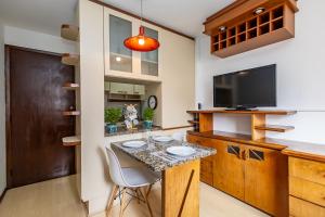 Køkken eller tekøkken på Apartamento inteiro de 1 quarto no Edifício Royal Light