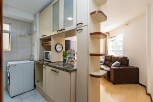 Køkken eller tekøkken på Apartamento inteiro de 1 quarto no Edifício Royal Light + 12 billeder