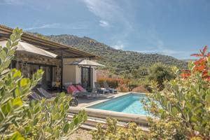 a villa with a swimming pool and a house at Villa Davia in Corbara +38 photos