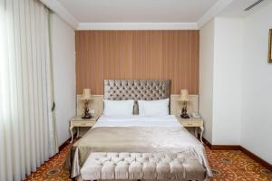 Postel nebo postele na pokoji v ubytování Atropat Boutique Hotel + 36 fotografií