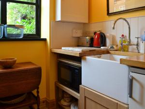 Kuchyň nebo kuchyňský kout v ubytování The Little House