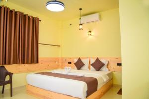 Postel nebo postele na pokoji v ubytování The Scenario Ella