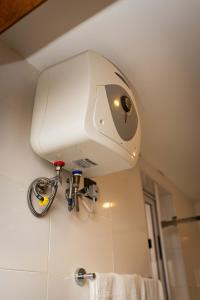 Ένα μπάνιο στο Libi Apartment-BlueWaters Property Mgt LTD