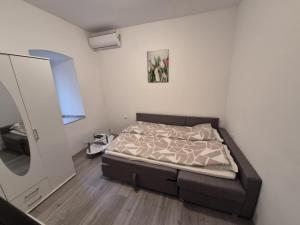 Ένα ή περισσότερα κρεβάτια σε δωμάτιο στο Masal