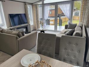 Χώρος καθιστικού στο Lime Tree Lodge