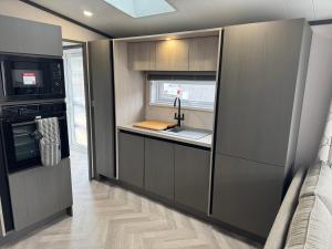 Η κουζίνα ή μικρή κουζίνα στο Lime Tree Lodge