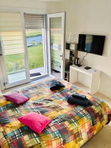 Ένα ή περισσότερα κρεβάτια σε δωμάτιο στο Fermata 3,5