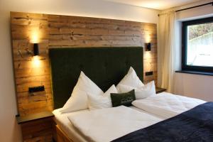 Ένα ή περισσότερα κρεβάτια σε δωμάτιο στο Annies Bergwelt Haus Waldherz