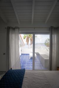 Ένα ή περισσότερα κρεβάτια σε δωμάτιο στο Uncle Bobs Reef