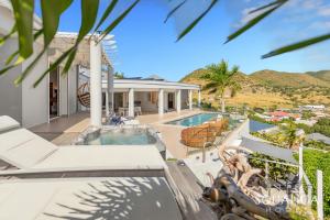 a view of a house with a swimming pool at Villa Venus, 4 bdr with view! in Cul de Sac