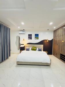 Ένα ή περισσότερα κρεβάτια σε δωμάτιο στο Merakie Homes