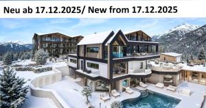 a house in the snow with a pool at Forster's Naturresort in Neustift im Stubaital