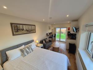 Postel nebo postele na pokoji v ubytování Misty Bay - Kenmare