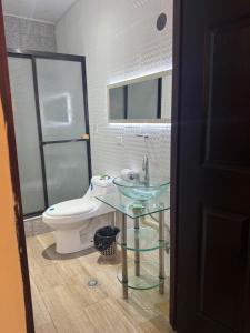 a bathroom with a sink and a toilet at INGRID LOFTS in La Unión +14 photos