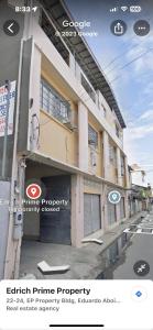 a building on the side of a street at Ciano's Hostel Cebu in Cebu City