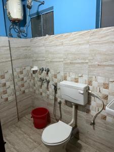 Ένα μπάνιο στο Krishna Inn