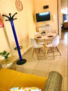 TV a/nebo společenská místnost v ubytování Residence Cuore