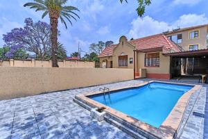 a swimming pool in the backyard of a house at 45 on westmoreland in Johannesburg
