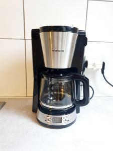 Kaffe- og tefaciliteter på Appartement d'Artiste