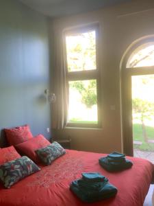 Postel nebo postele na pokoji v ubytování Le Clos des Tilleuls