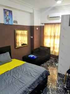 Ένα ή περισσότερα κρεβάτια σε δωμάτιο στο Short let apartments Lekki Ajah Lagos
