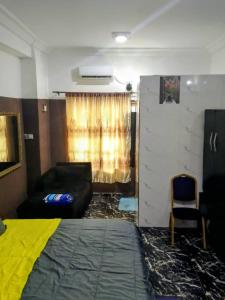 Ένα ή περισσότερα κρεβάτια σε δωμάτιο στο Short let apartments Lekki Ajah Lagos +6 φωτογραφίες